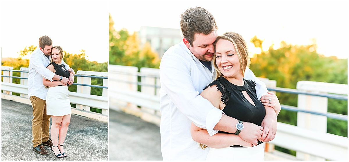 couple smiling during engagement session on parking garage