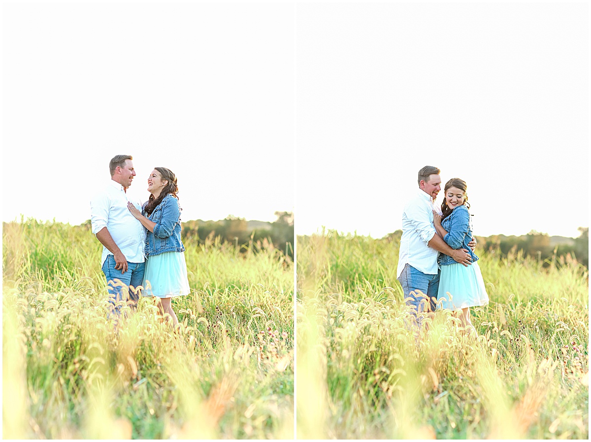 couple in field during engagement session